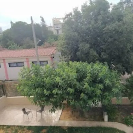 Μεγαλο Οροφοδιαμερισμα Με Κηπο Και Παρκιν-Καλαματα Apartment Asprokhoma